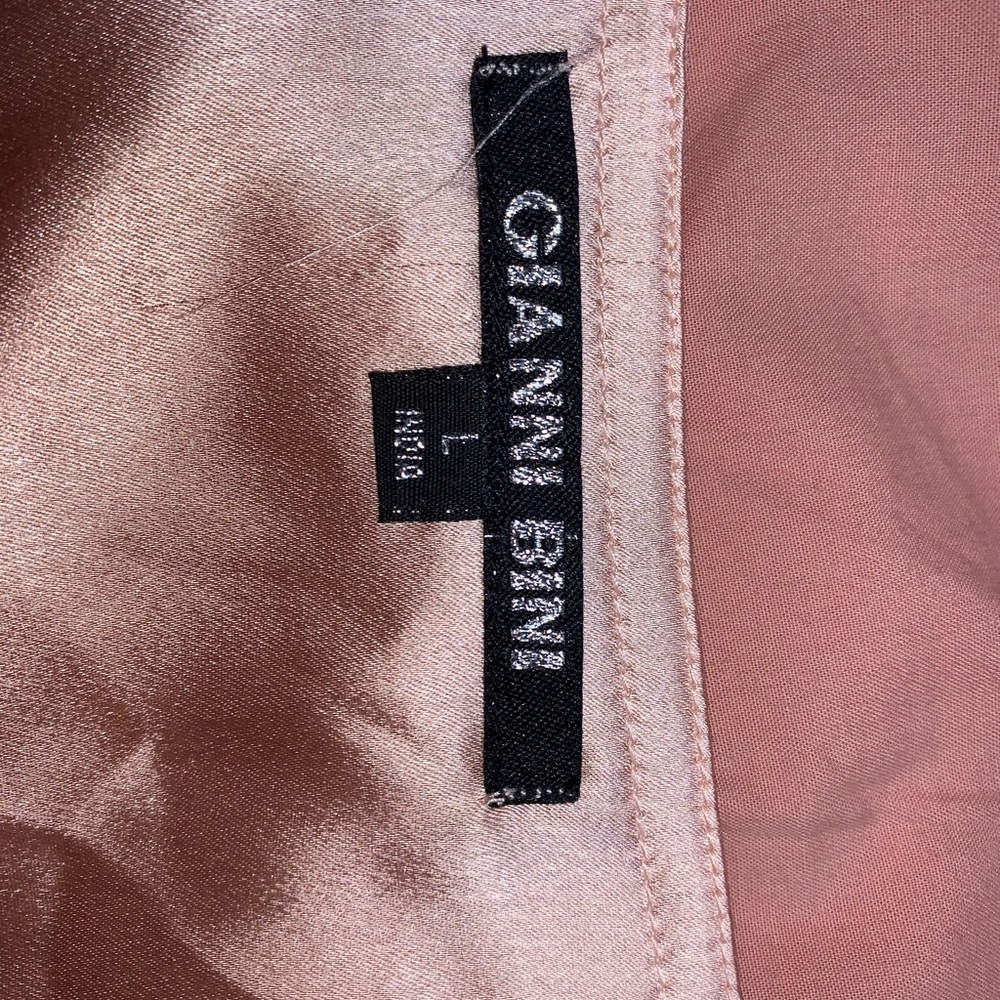 A Pink Gianni Bini sequin dress.